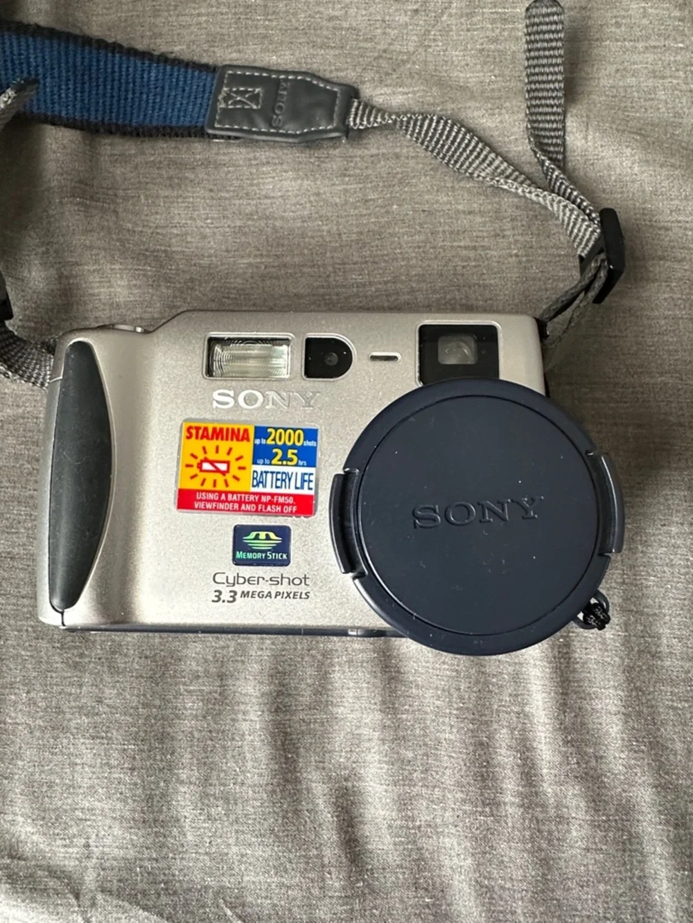 Sony Silver Point-and-Shoot Cyber-shot DSC-S70 Camera with Blue Neck Strap